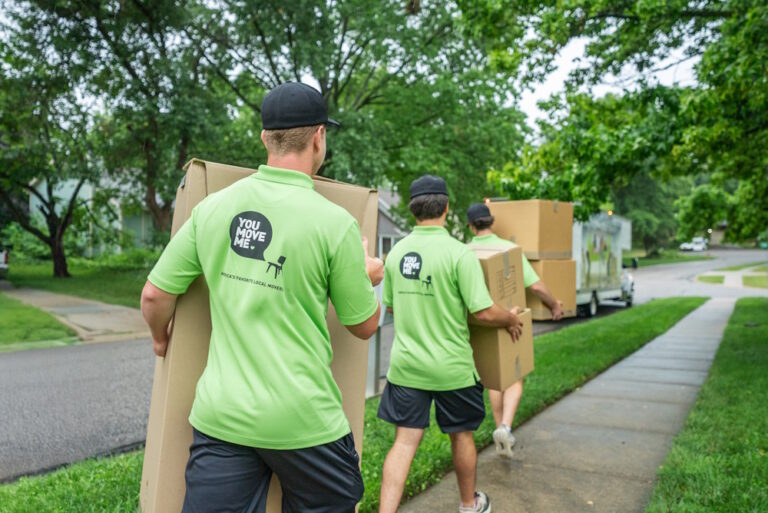 movers carrying boxes